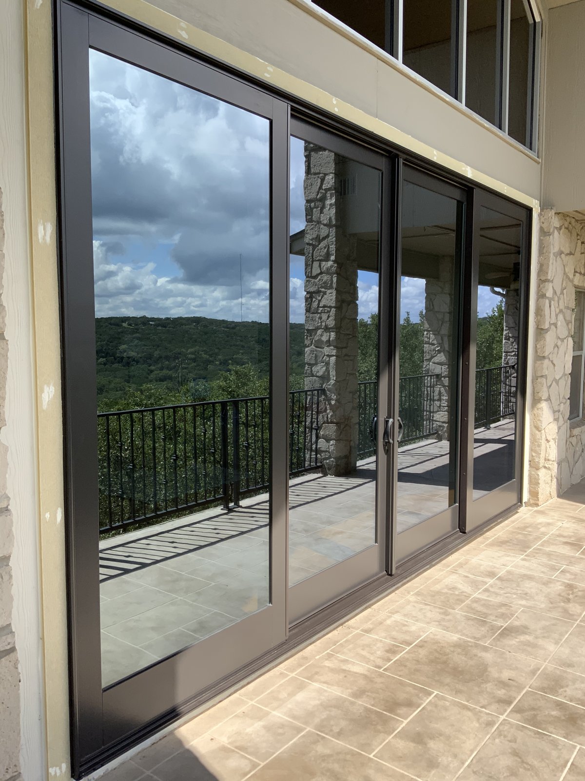 After: new Renewal by Andersen patio door with dark frames